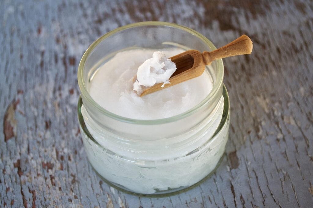 coconut oil on wooden spoon, coconut oil in glass jar, oil-2090575.jpg